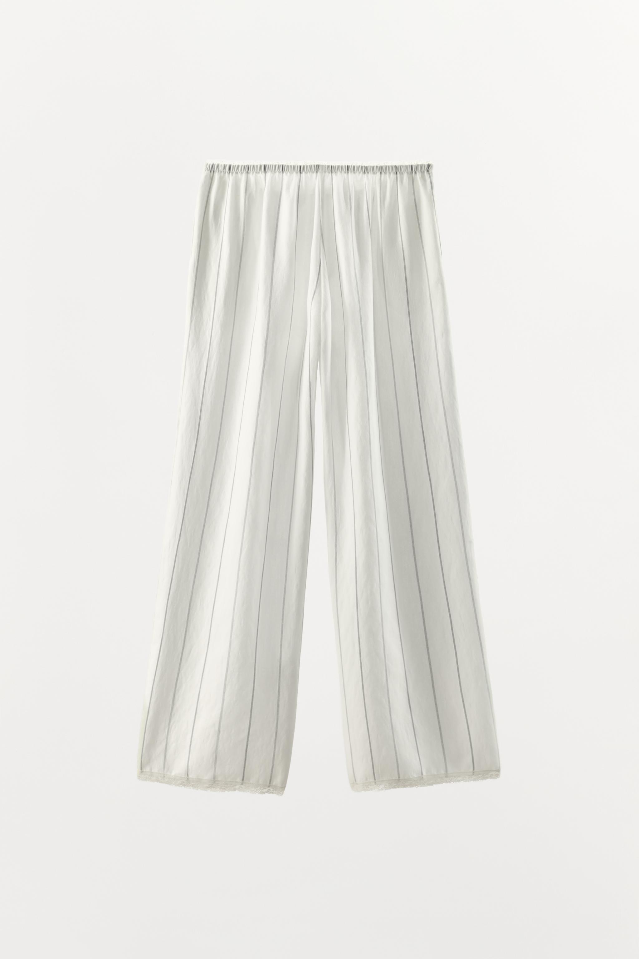 PANTALON À RAYURES ET DENTELLE